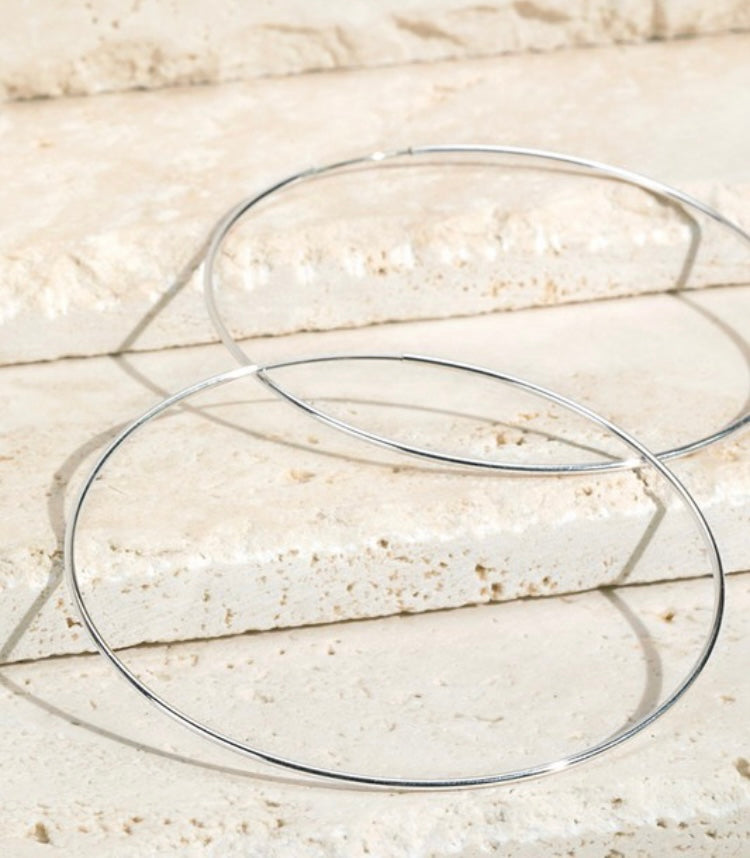 A simple and shiny metal dangle infinity hoop earrings 298
